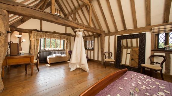 Cain Manor bridal suite with hanging wedding dress