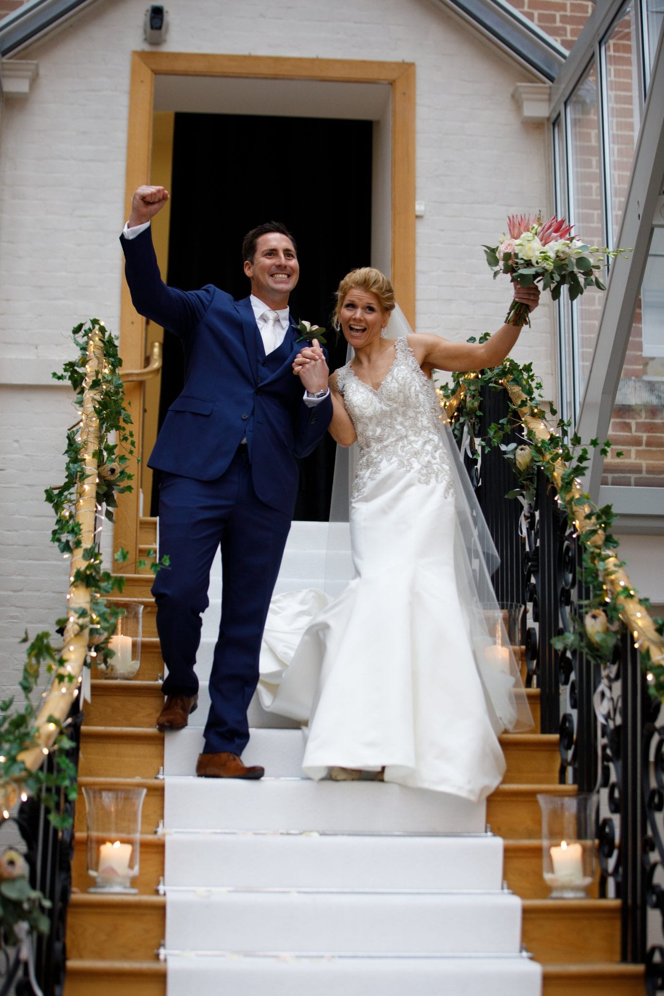 Bride & Groom Wedding breakfast entrance Botleys Mansion