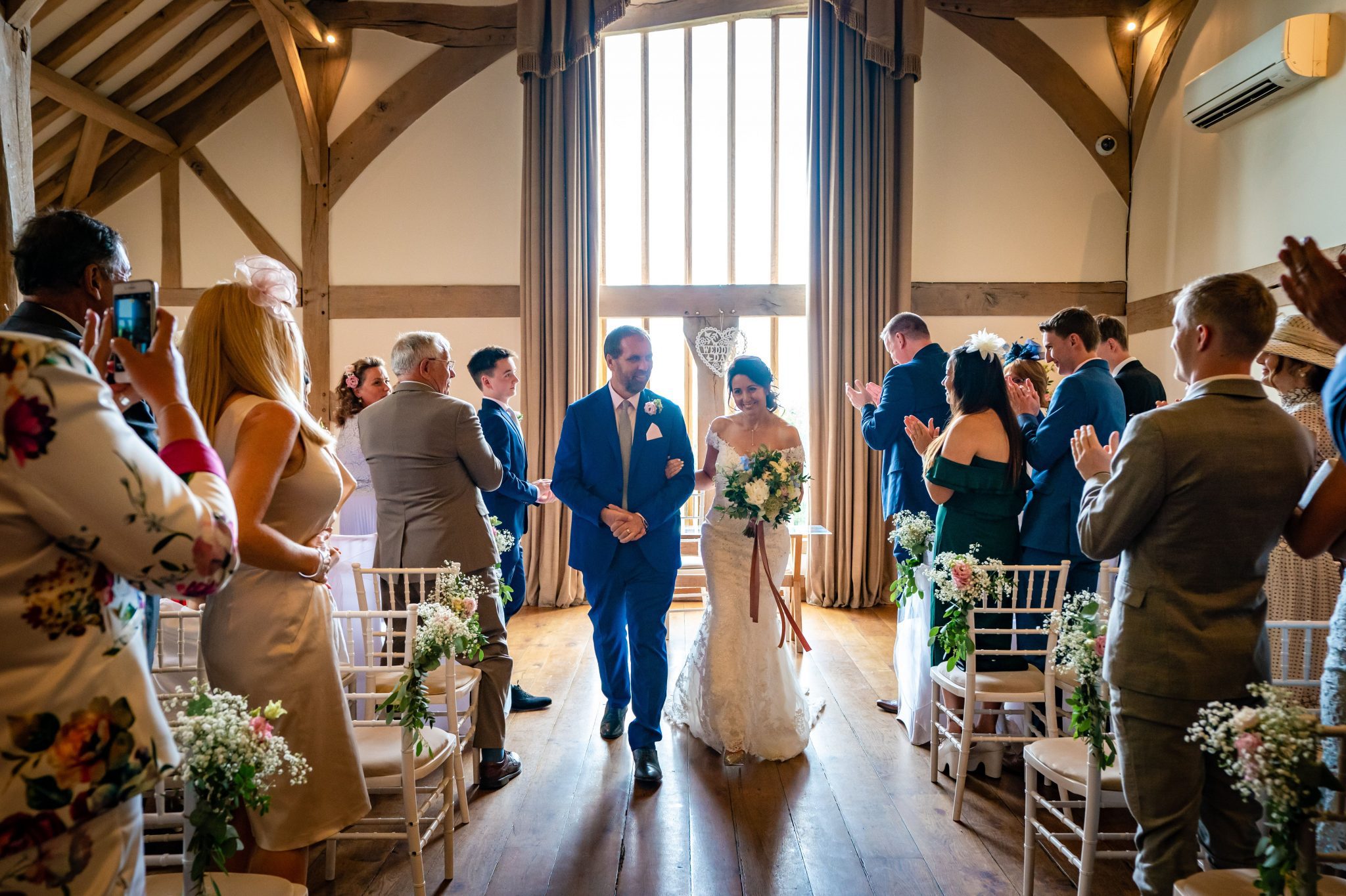 Erika and Michael walking down the isle